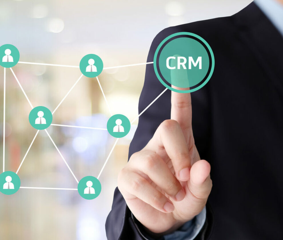 Businessman hand touch CRM, Customer Relationship Management, ic